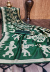 Dark green color raw silk saree with woven contrast pallu