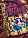 Magenta color paithani silk saree with attractive pallu