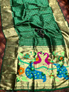 Green color paithani silk saree with attractive pallu