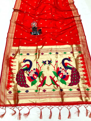 Red color paithani silk saree with attractive zari weaving pallu