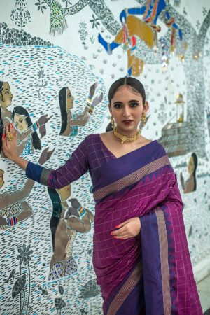 Magenta color soft raw silk saree with zari woven work