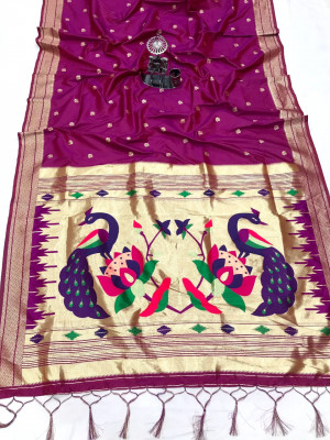 Magenta color paithani silk saree with attractive zari weaving pallu