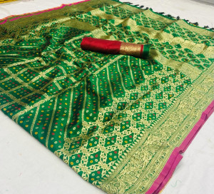 Green color bandhani silk saree with zari weaving work