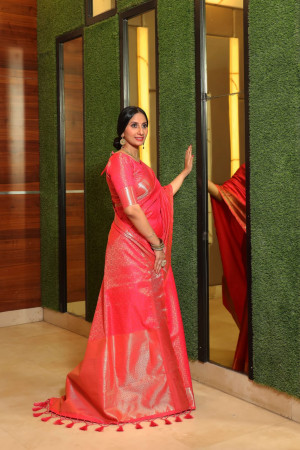 Pink color soft banarasi silk saree with zari woven border