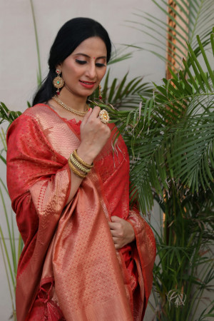 Red color soft banarasi silk saree with zari woven border