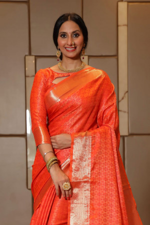 Orange color soft banarasi silk saree with zari woven border