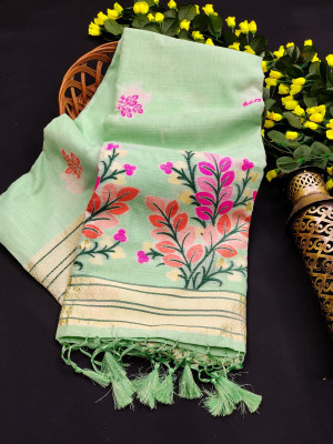 Pista green color linen saree with zari weaving border
