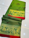Green color muslin silk saree with zari weaving work