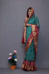Rama green and maroon art silk saree with hand bandhej print