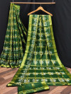 Mahendi green color cotton saree with patola printed work