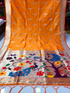 Mustard yellow color paithani silk saree with woven design pallu