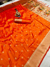 Orange color paithani silk saree with goldan zari  weaving work