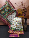 Green and magenta color soft cotton saree with patola printed work