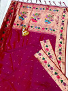 Dark pink color paithani silk saree with zari weaving work