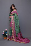 Green and rani pink art silk saree with hand bandhej print