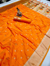 Orange  color paithani silk saree with goldan zari  weaving work