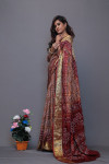 Beige and maroon art silk saree with hand bandhej print