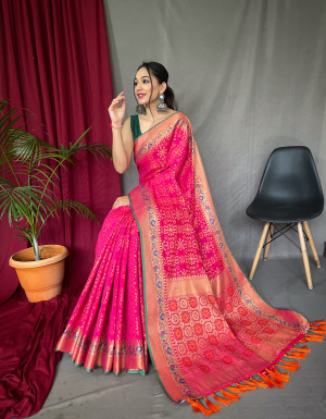 Rani pink color patola silk saree with woven design