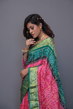 Pink and green art silk saree with hand bandhej print