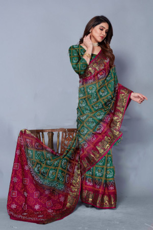 Green and purple color bandhani silk saree with khadi printed work