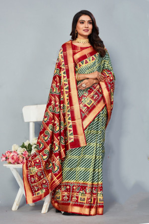 Red and green color soft cotton saree with patola printed work