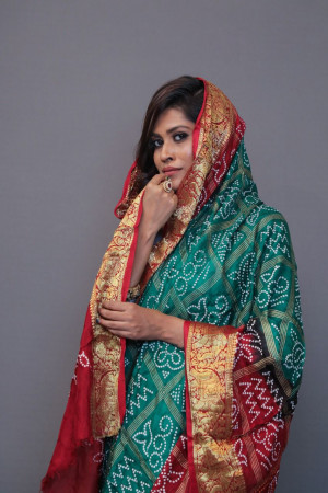 Rama green and maroon art silk saree with hand bandhej print
