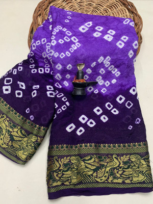 Purple color hand bandhej bandhani silk saree with zari weaving work