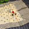 Off white color soft handloom raw silk saree with woven design