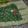 Bottle green color soft handloom raw silk saree with woven design