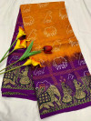 Mustard yellow and purple color bandhani silk saree with khadi printed work