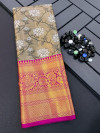 Beige color tissue silk saree with zari weaving work