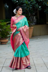 Sea green color kanchipuram silk saree with zari weaving work