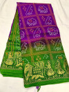 Purple and green color bandhani silk saree with khadi printed work