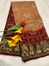 Beige and maroon color bandhani silk saree with khadi printed work