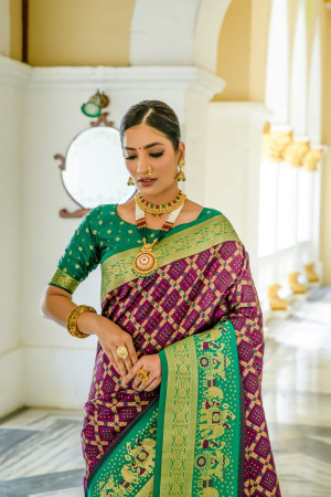 Wine color banarasi silk saree with patola design and zari weaving work