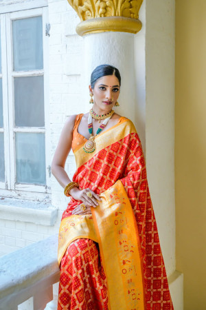 Red color banarasi silk saree with patola design and zari weaving work