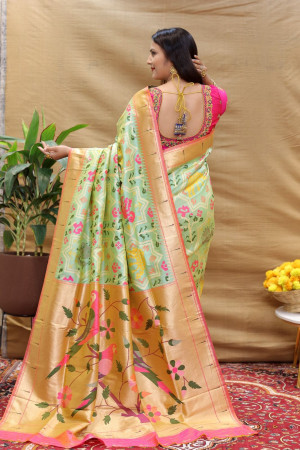 Light pista green color paithani silk saree with zari weaving work