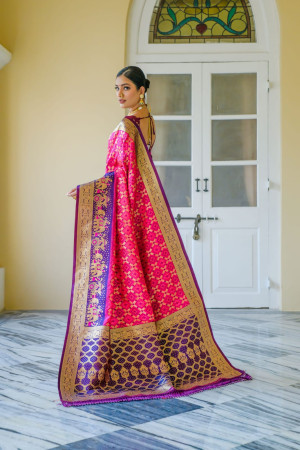 Pink color banarasi silk saree with patola design and zari weaving work