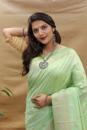 Pista green  color banarasi silk saree with zari weaving work