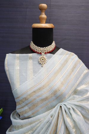 Sky blue color soft tussar silk saree with zari weaving work