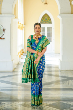 Royal blue color banarasi silk saree with patola design and zari weaving work