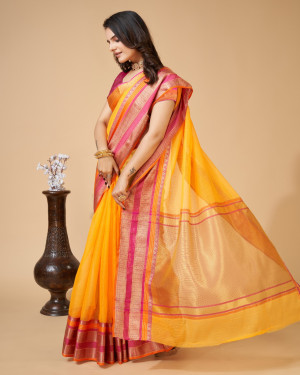 Yellow color kota doriya saree with zari weaving work