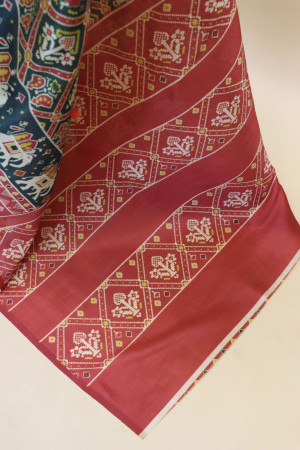 Bottle green color soft cotton patola saree with printed work