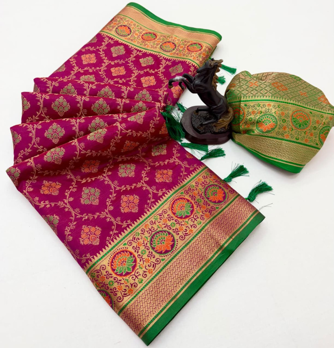 Heer Rani Rani pink color soft patola silk saree with golden zari weaving work