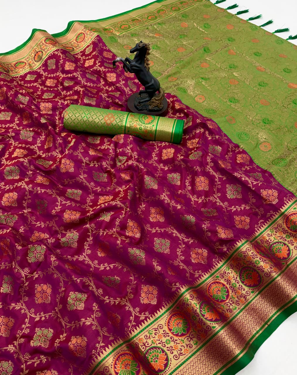 Heer Rani Rani pink color soft patola silk saree with golden zari weaving work