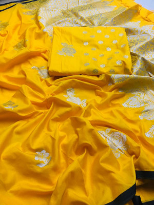Yellow color lichi silk saree with zari work
