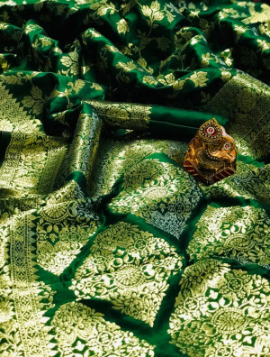 Green color pure silk saree with zari work