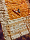 Mustard yellow color soft banarasi silk saree with zari weaving pallu