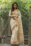 Off white color aasam silk saree with embroidered cut work