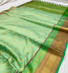 Green color soft kanchipuram silk saree with zari weaving work